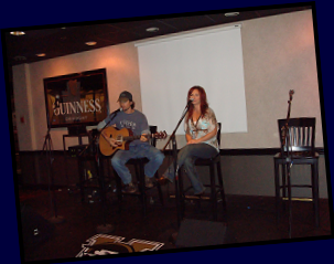 Pat and Janine performing at a songwriter's night at the Commodore in Nashville